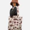 Borsa tote marrone in pelliccia sintetica Borsa tote marrone in pelliccia sintetica